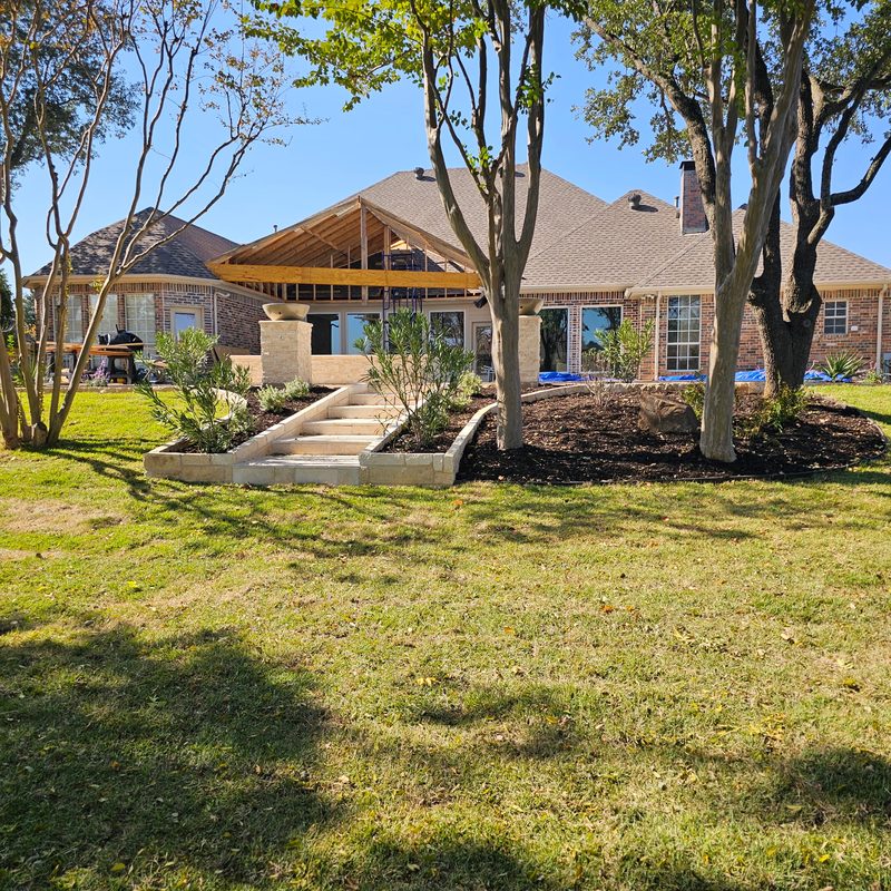 Backyard with new sod and stone steps