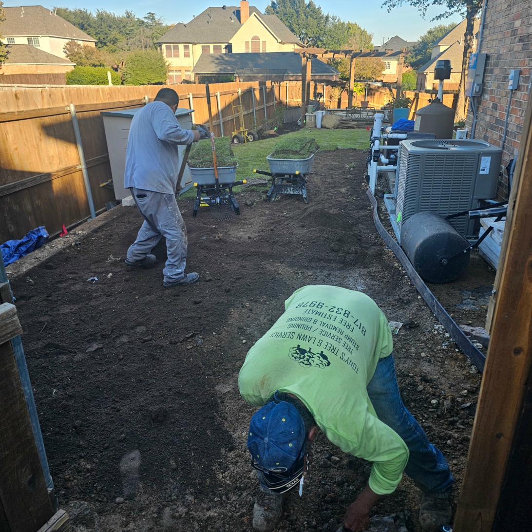 Tony's Lawn & Tree crew working on a landscape project