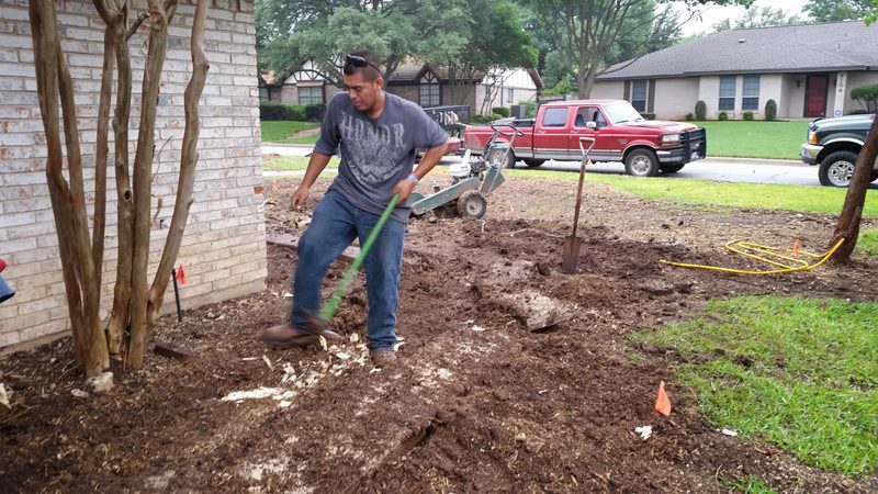 Jose working on landscape bed preparation