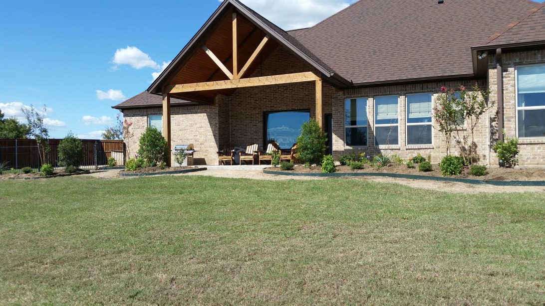 New build patio area with fresh sod