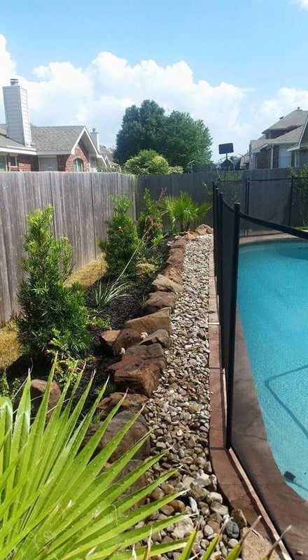 Pool plantings with river rock