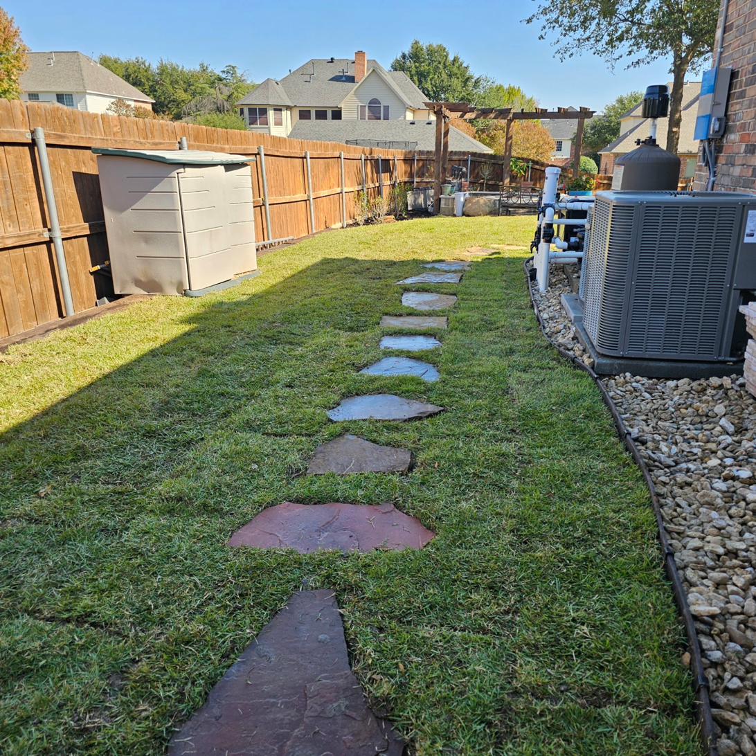 Side yard with flowering shrubs